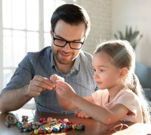 father and daughter crafting