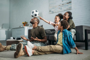 family playing with a ball