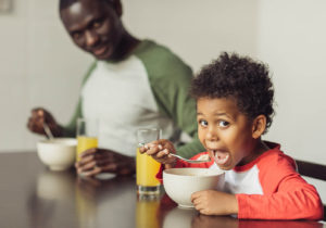 child eating with a spoon