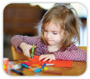 child using scissors