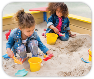 2 girls in a sandbox