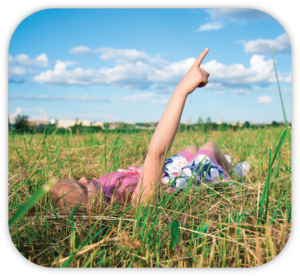 child watching clouds