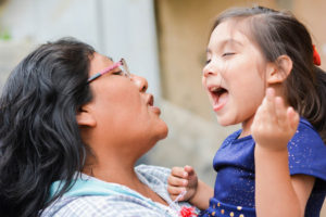 Mom and child singing