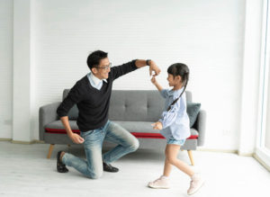 Father and daughter dancing