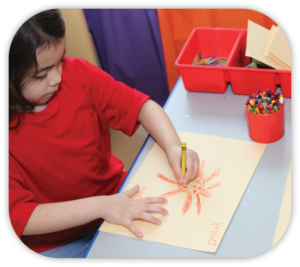 girl drawing an octopus