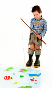 boy fishing from a pretend lake