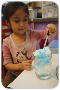 girl showing cloud in a jar