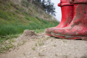 red muddy boots